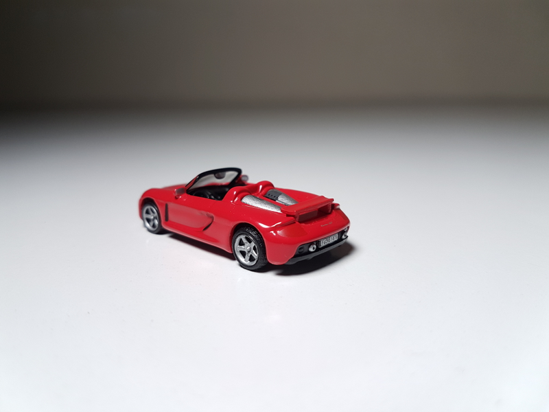 Illustration for article titled Makeitfit Monday: Rennsport Reunion Edition - Malibu International 1:87 Porsche Carrera GT